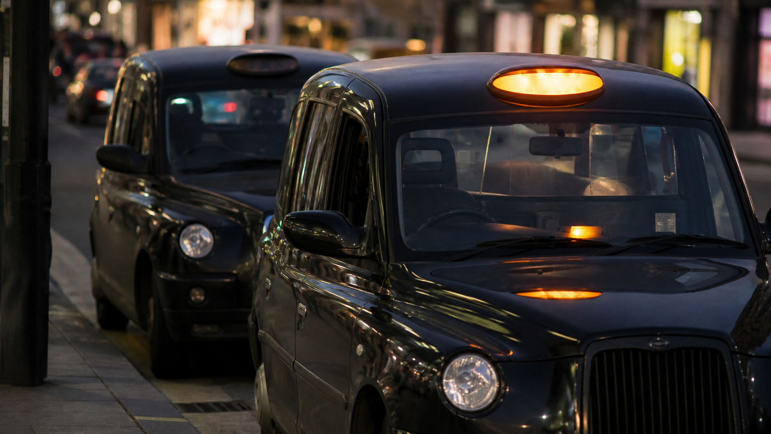 Roof light on means the taxi is empty. Roof light off means it is taken.