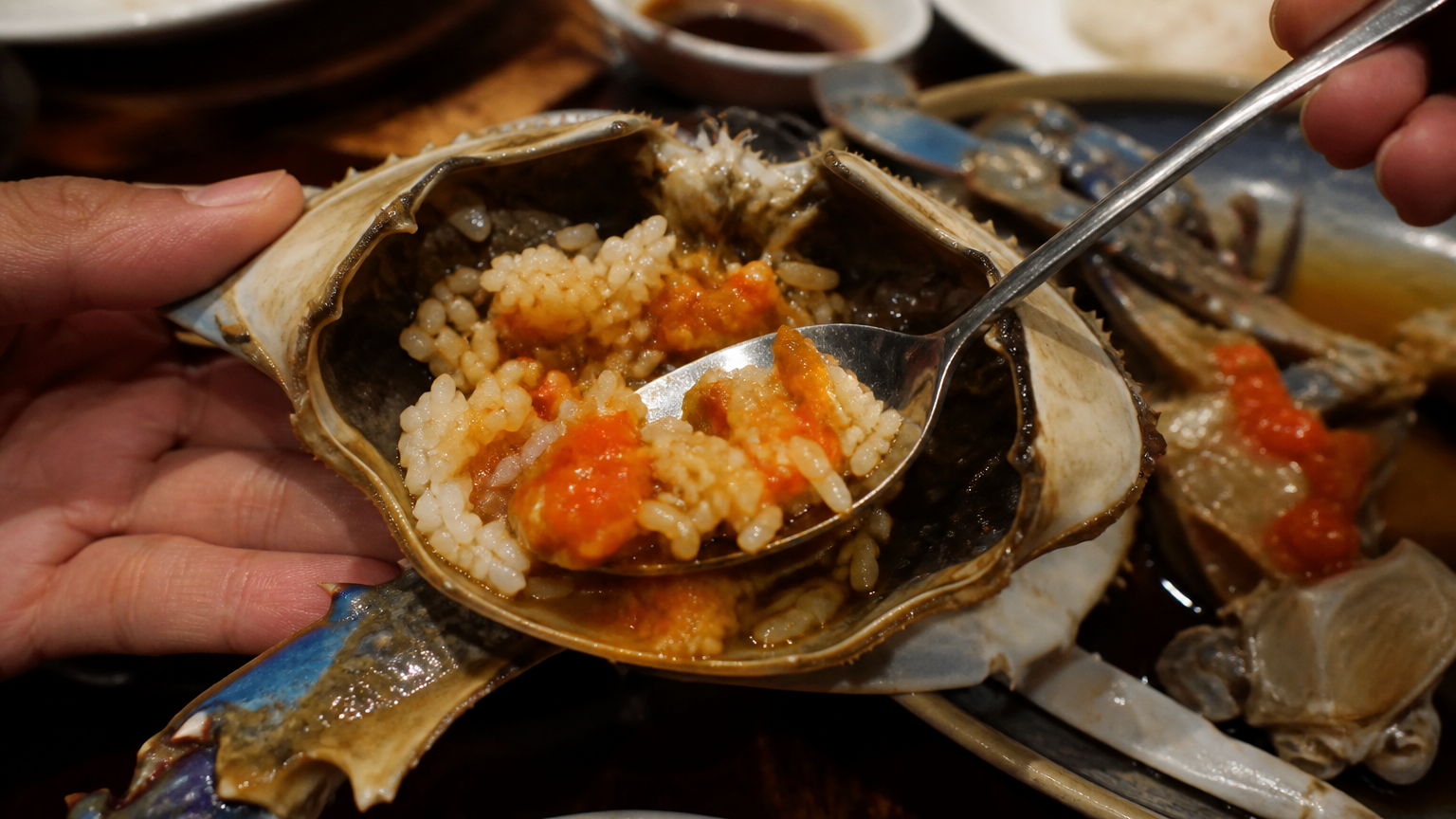 Rice mixed into the shell, where the roe and brine have pooled.