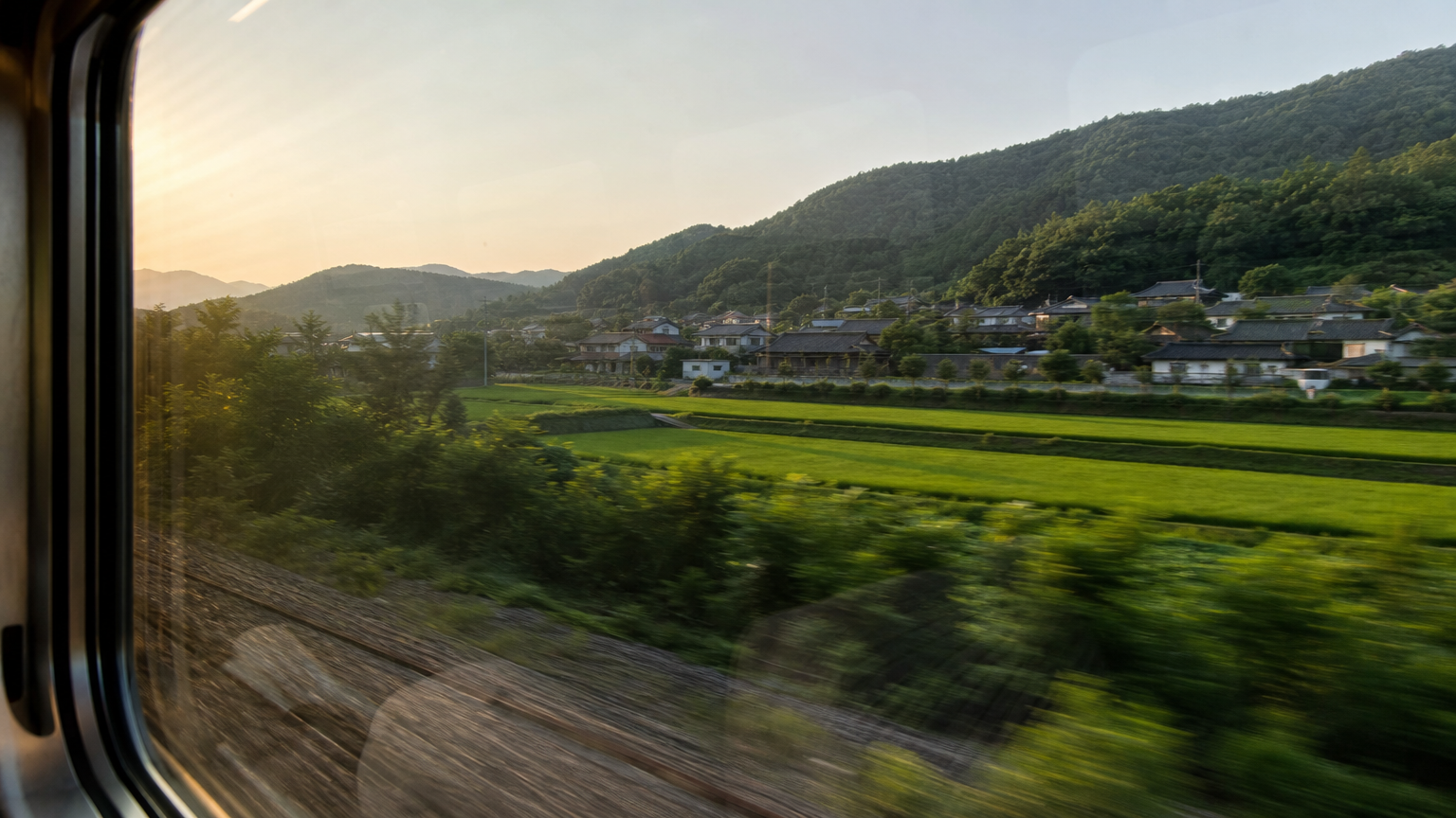 Rice paddies and low hills for most of the way south.