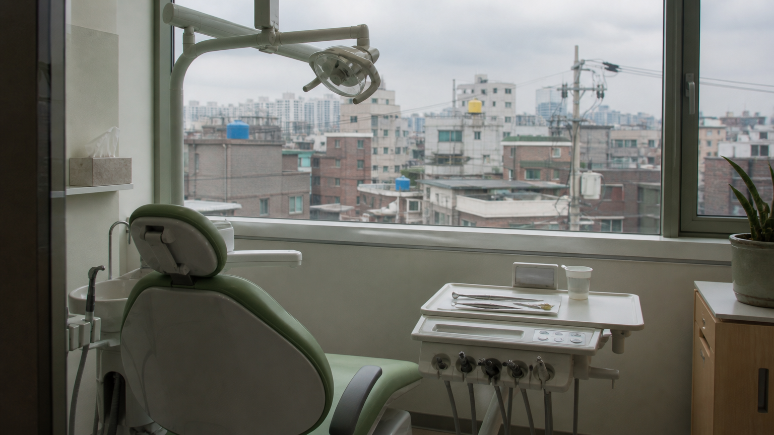 A treatment room in a small clinic. Functional rather than luxurious. Illustrative image.