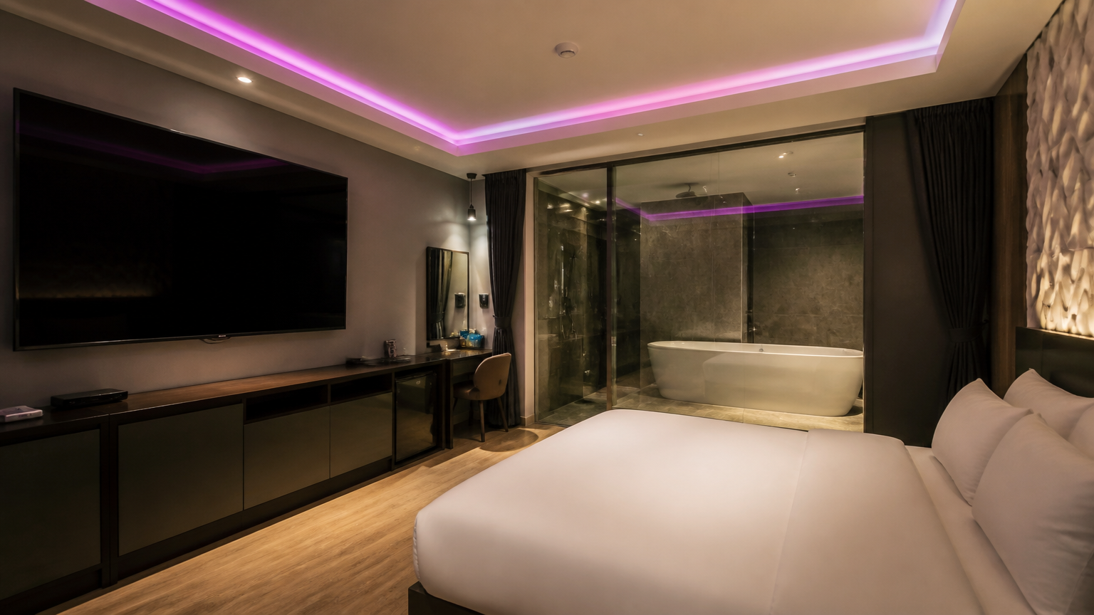 Coloured lighting, an oversized screen, a large bathtub. Illustrative image.