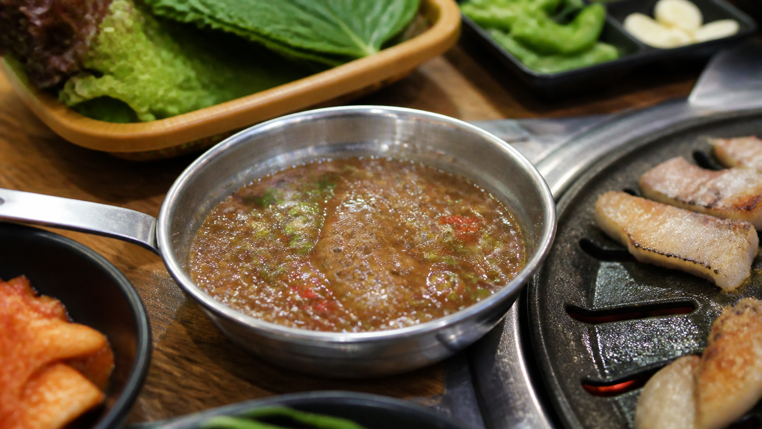 Myeoljeot, warmed in its own pan. Salty by design.