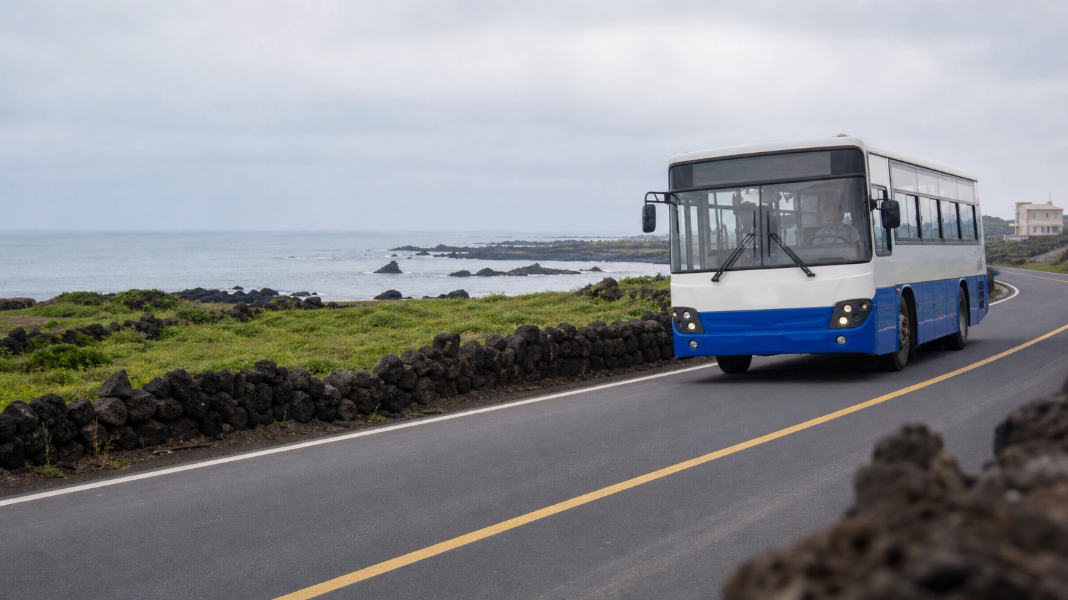 A Jeju bus on the coastal ring road. Express services take the roads; trunk services take the stops.